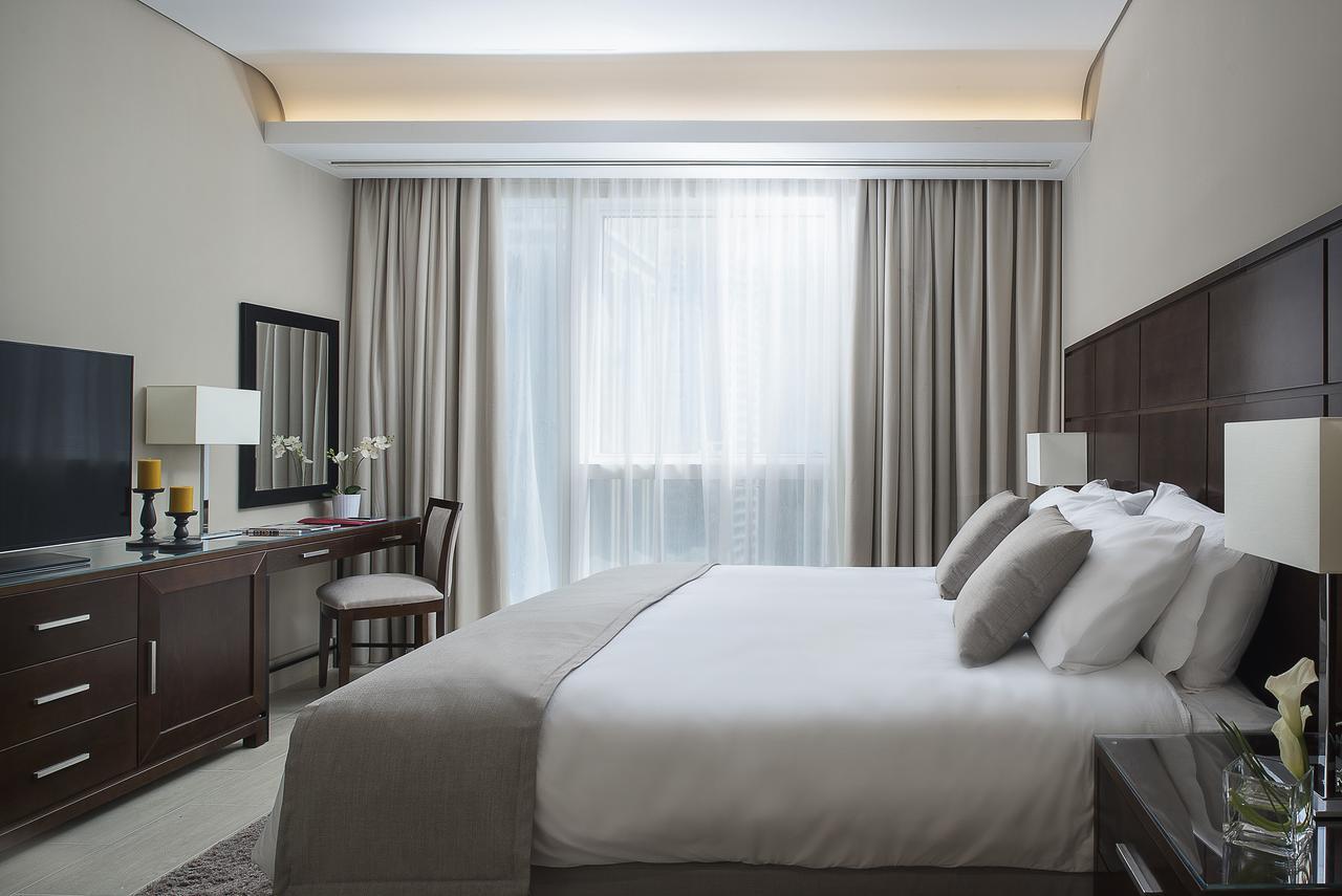 Dusit Doha Hotel Eksteriør billede A bedroom